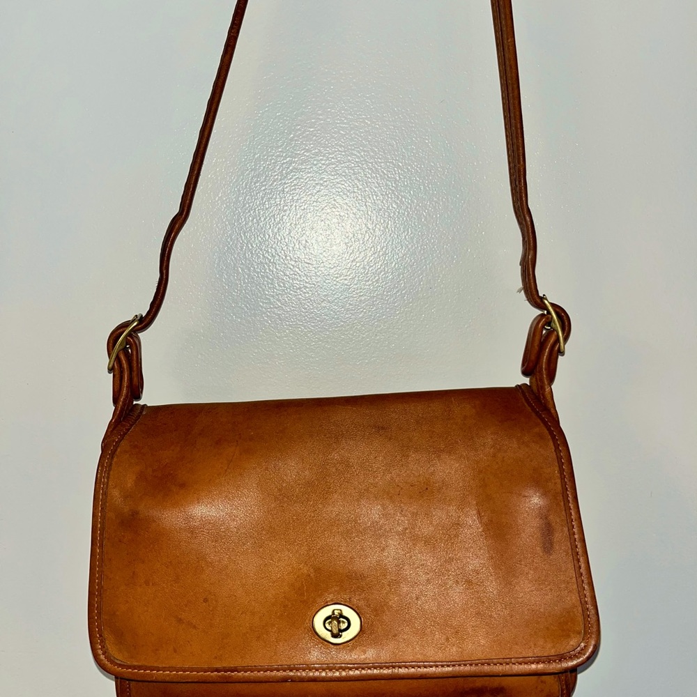Coach Wristlet of your choice AND 1/15 chance of winning this Vintage COACH.